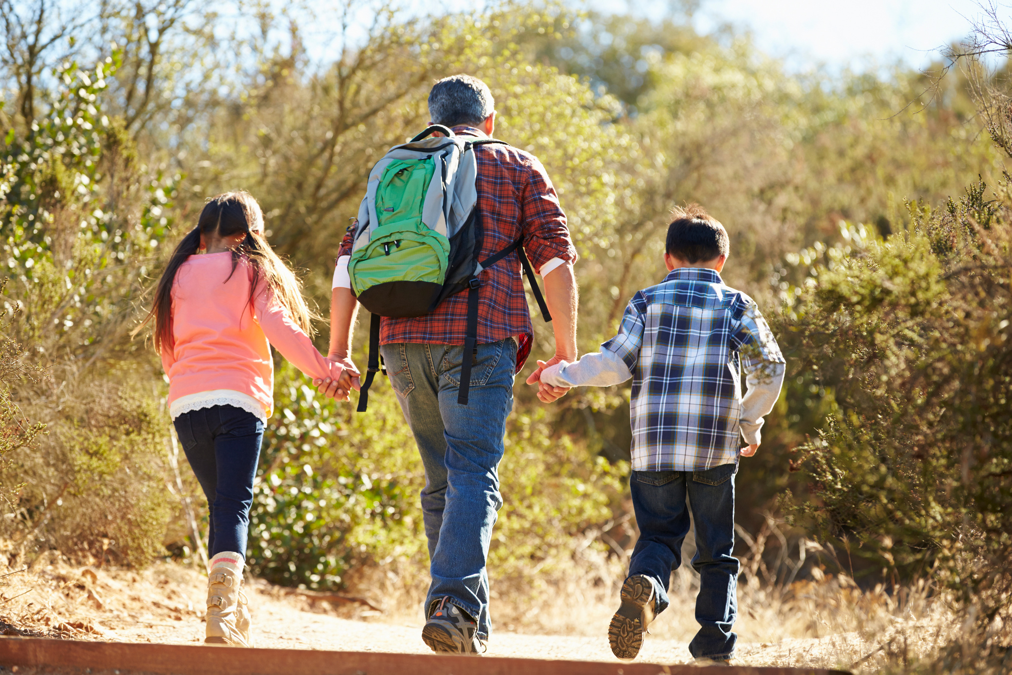 Father and Children Hiking 